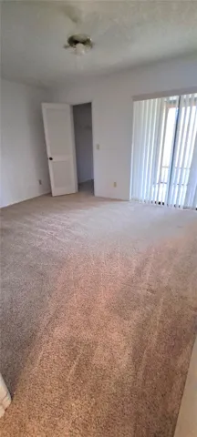 Bedroom 2 - Walk in Closet &amp; Access to back enclosed port.