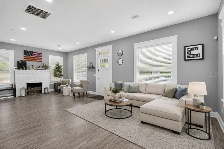 virtually staged LIVING ROOM FAMILY ROOM COMBO