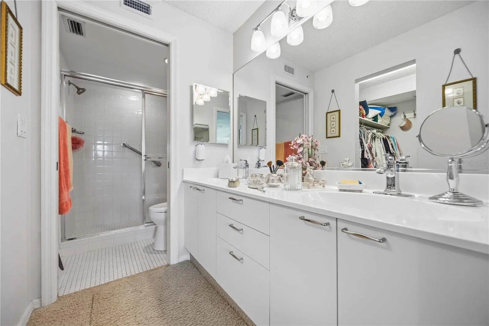 master vanity and walk-in shower