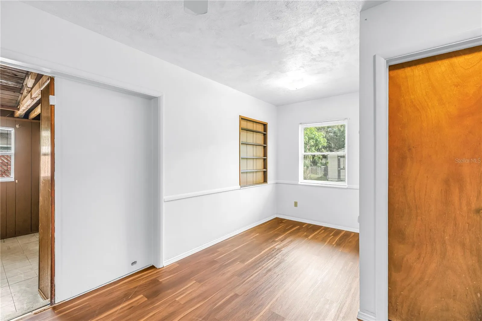 Dining/kitchen space view into Florida/Bonus Room