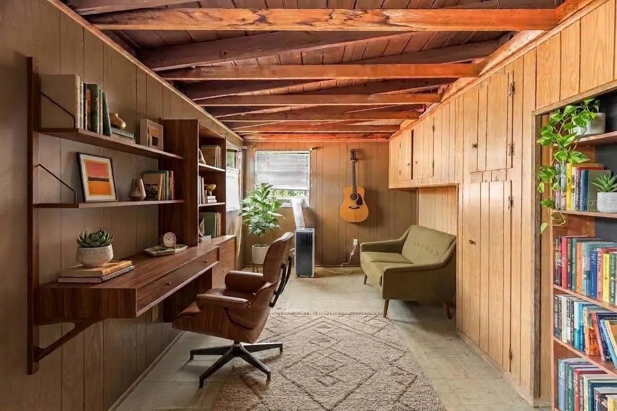 Virtually staged furniture and built in desk on the left