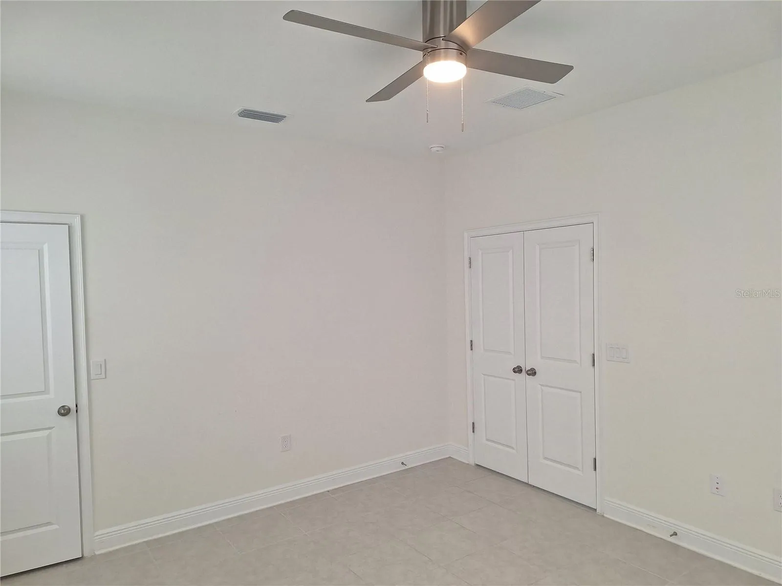 DOWNSTAIRS BEDROOM DOUBLE DOORS