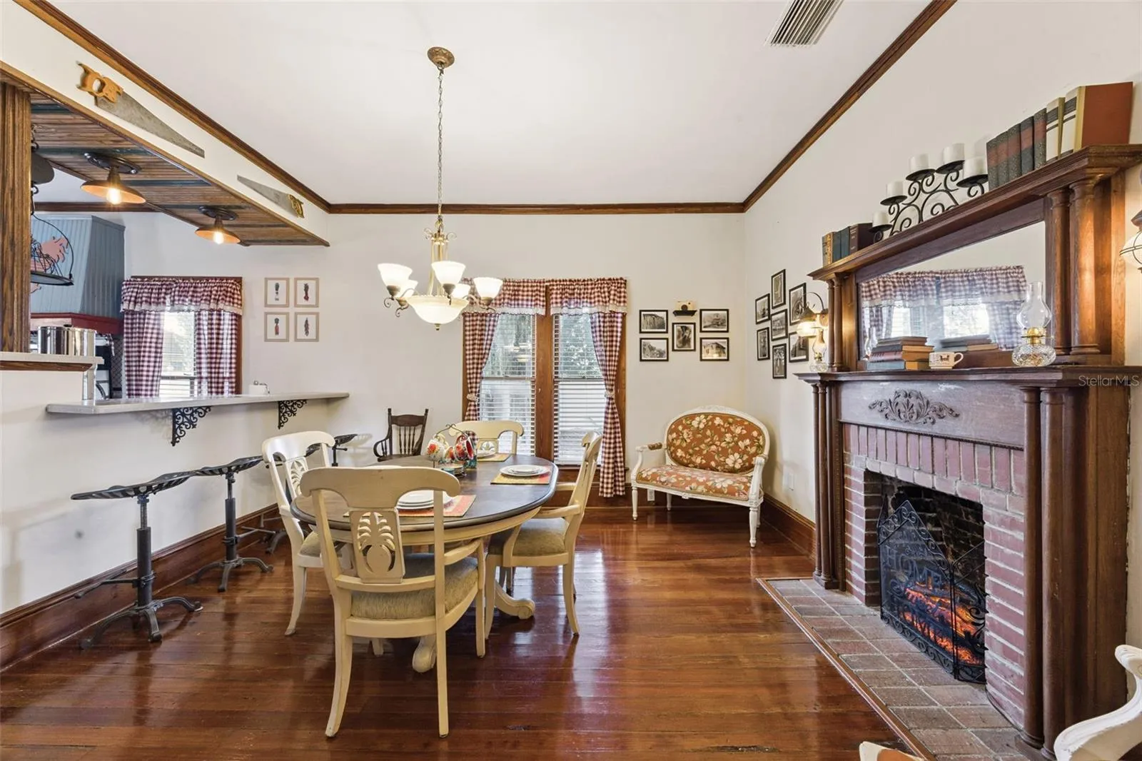 Original wood floors, substantial windows and a handsome fireplace give the home warmth and character.