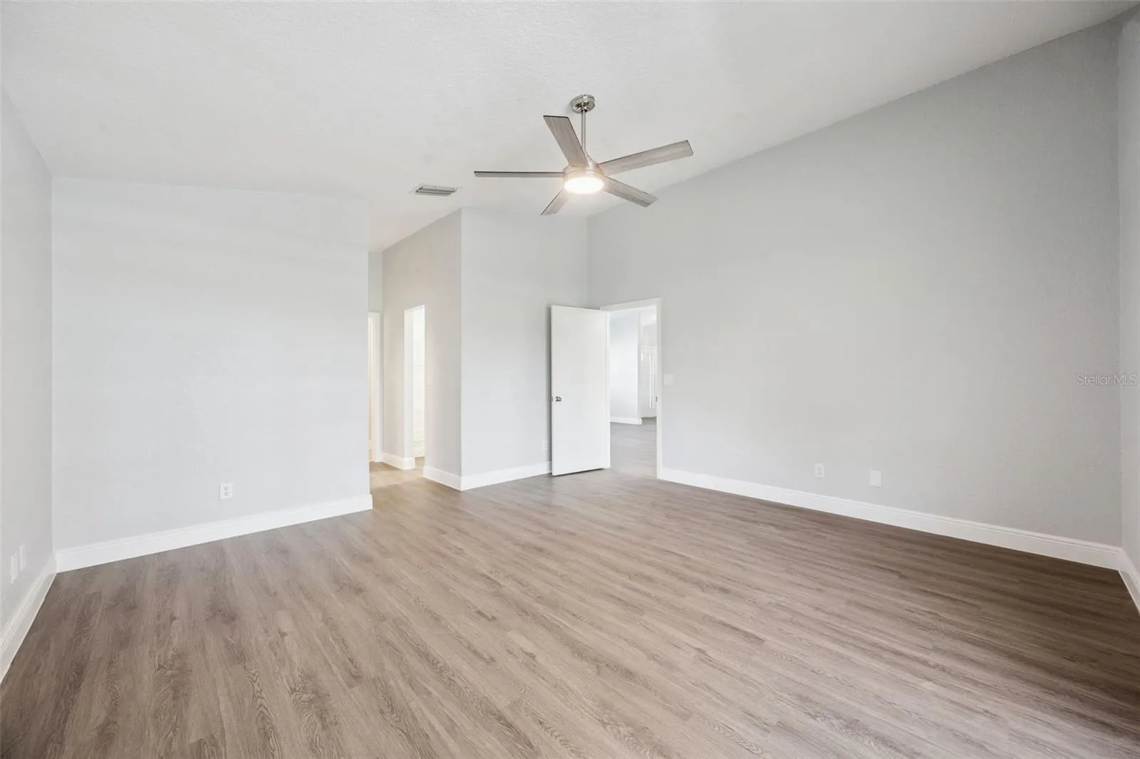 Primary Retreat with His & Her walk-in closets, direct access to covered Lania and en suite bath