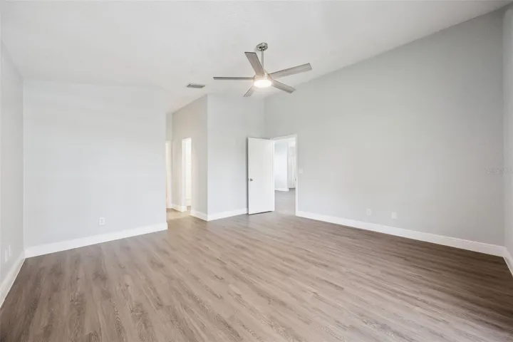 Primary Retreat with His & Her walk-in closets, direct access to covered Lania and en suite bath