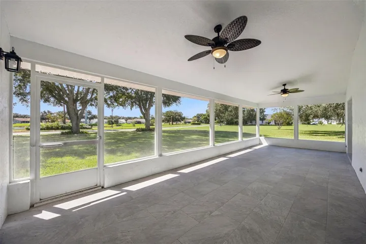 covered patio/lanai (accessible from dining/kitchen, Primary Bedroom and guest bath