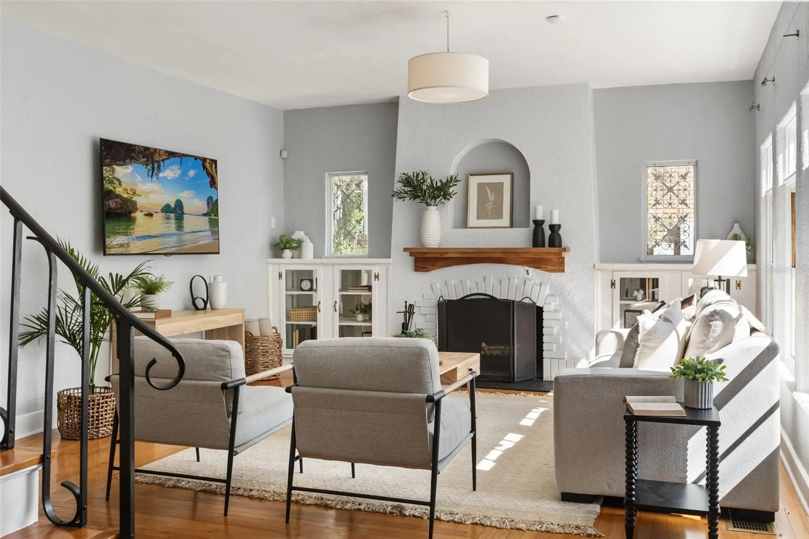 Living room with wood burning fireplace