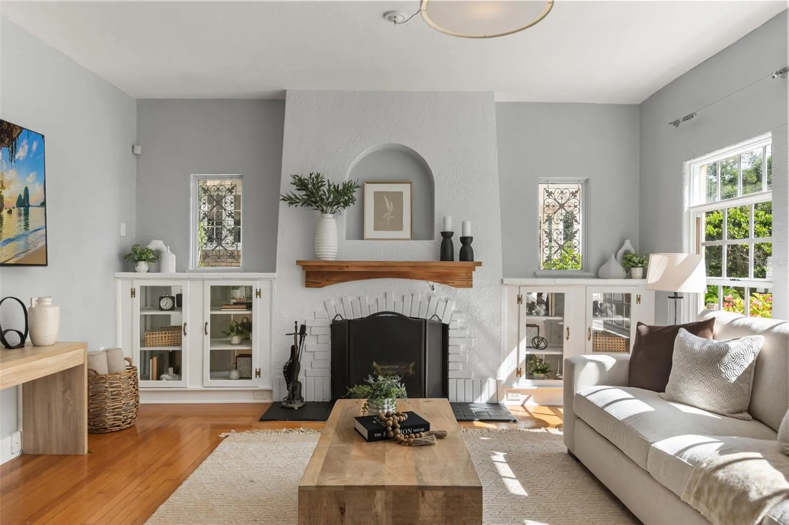 Living room with wood burning fireplace