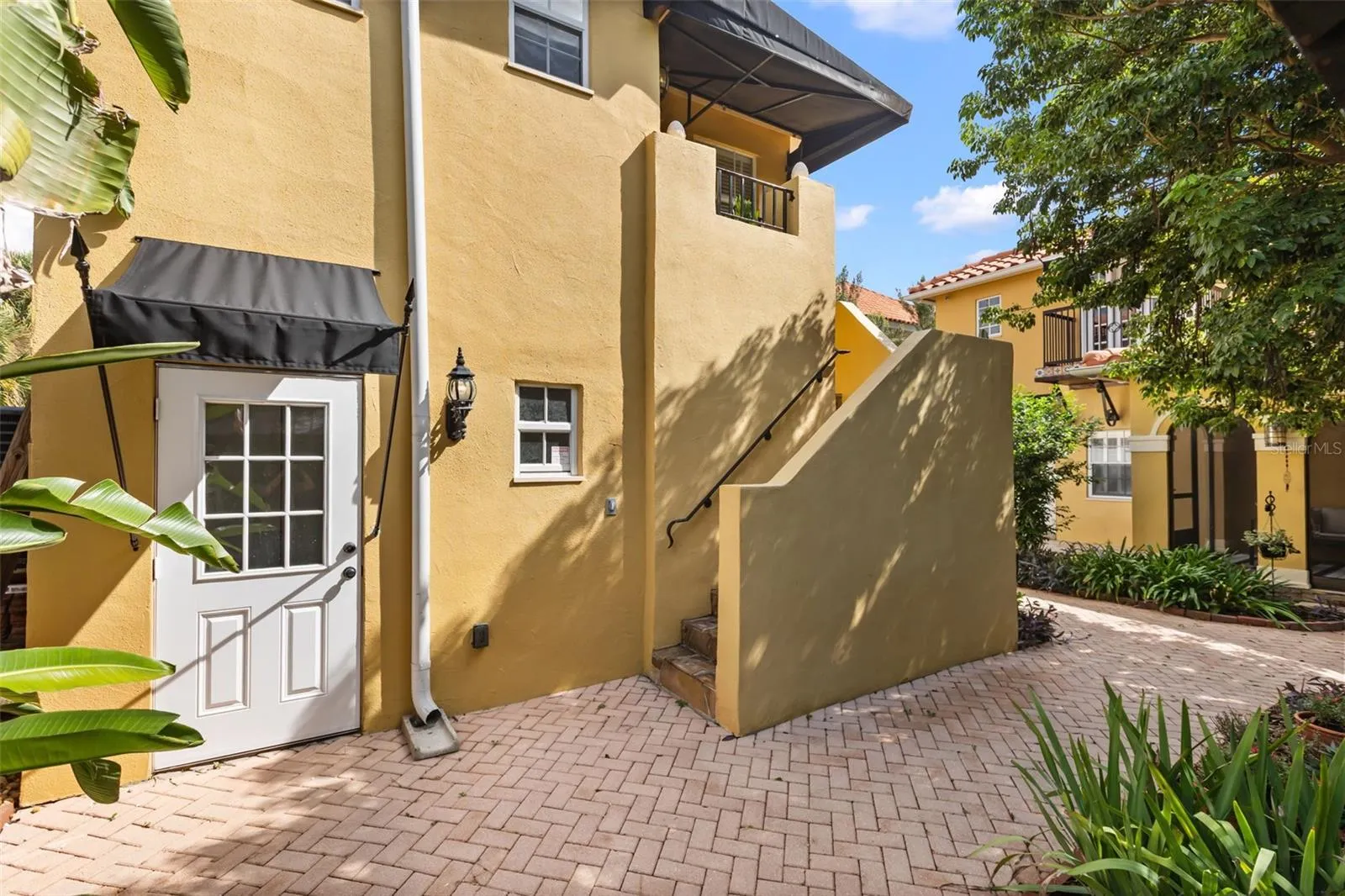 Two car garage and guest house entrance