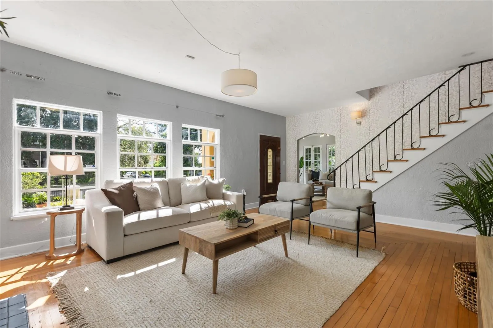 Living room with wood burning fireplace