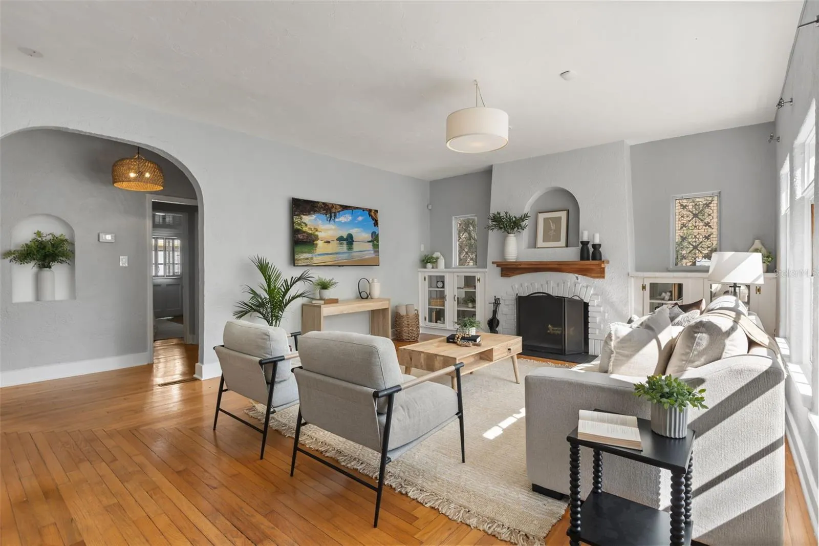 Living room with wood burning fireplace