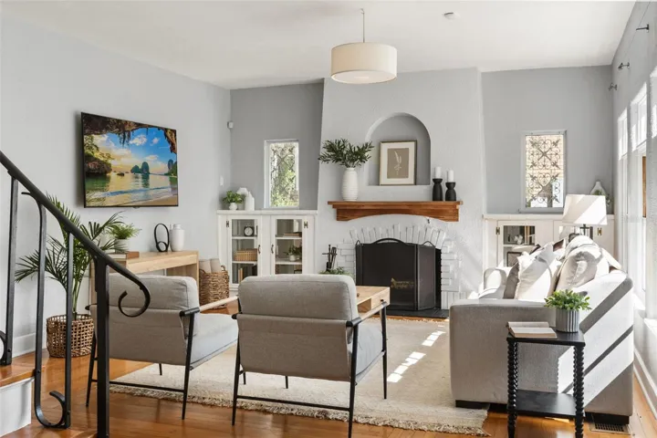 Living room with wood burning fireplace