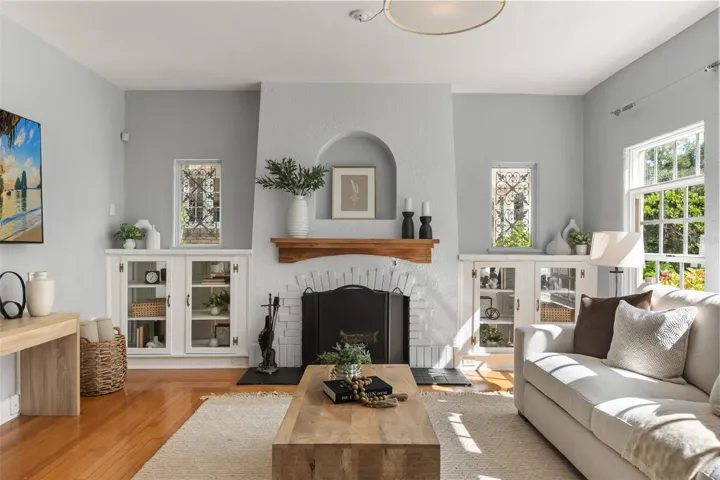 Living room with wood burning fireplace