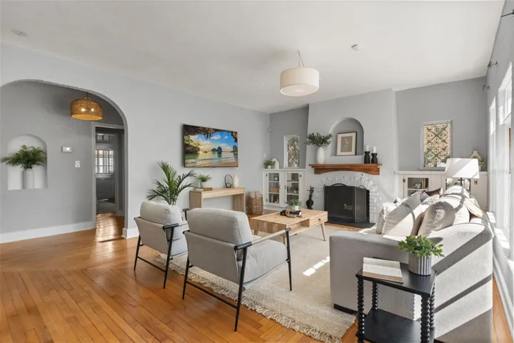 Living room with wood burning fireplace