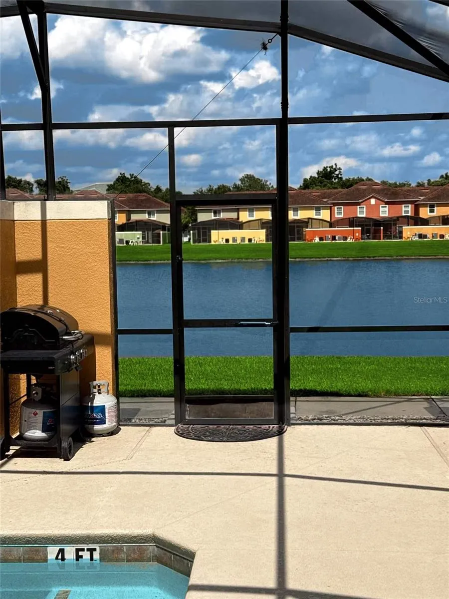 Screened lanai overlooking the pond
