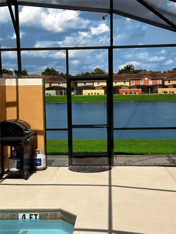 Screened lanai overlooking the pond