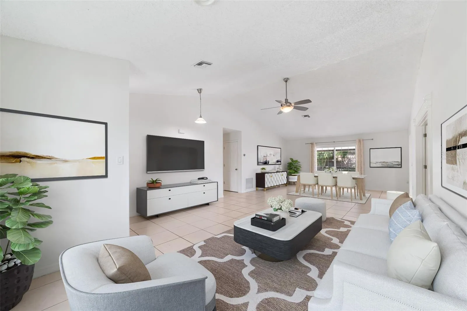 Open living and dining. Virtually Staged.