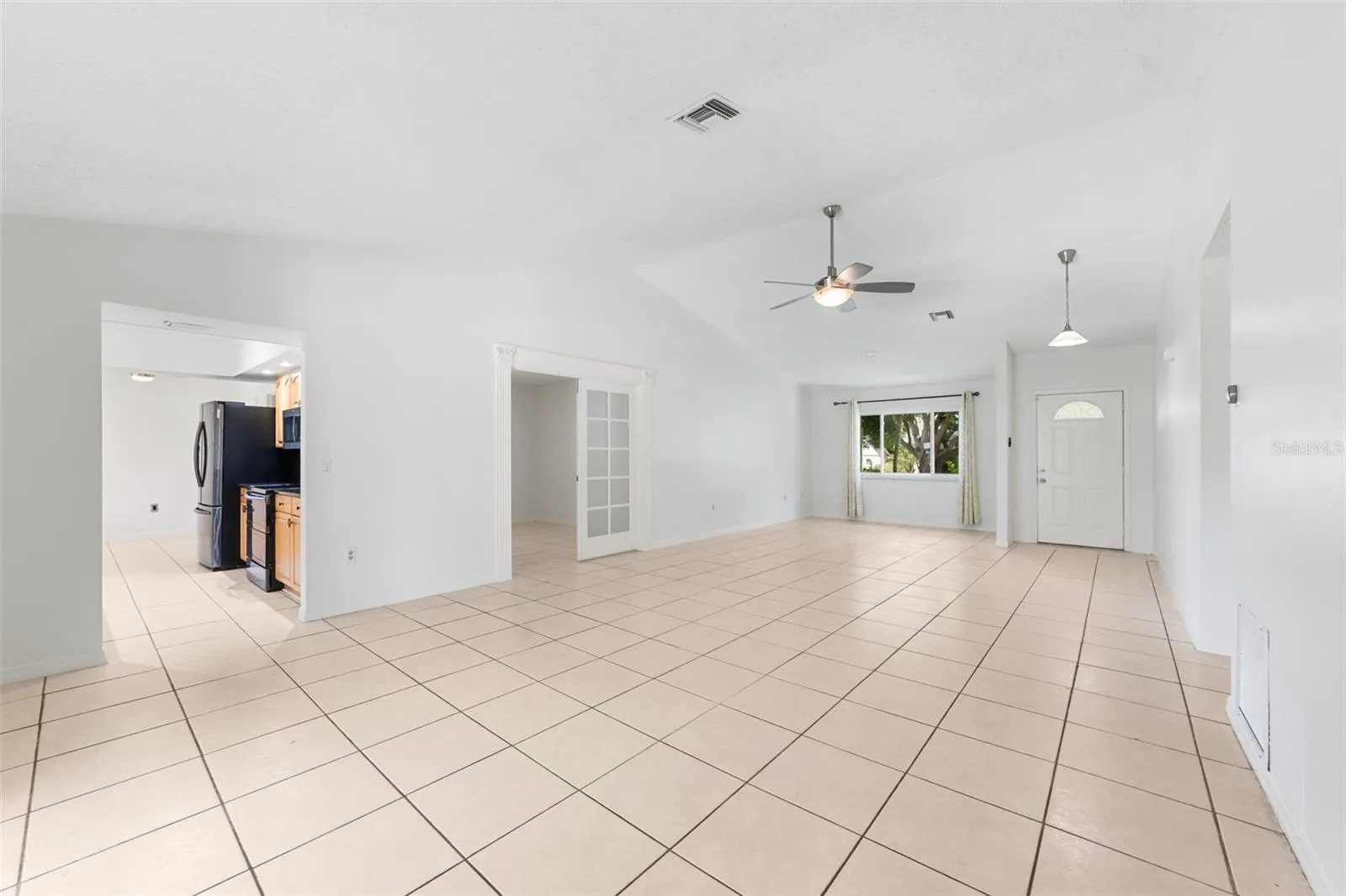 Light, bright open concept with a seamless flow out to the lanai and into the kitchen and flex/office.
