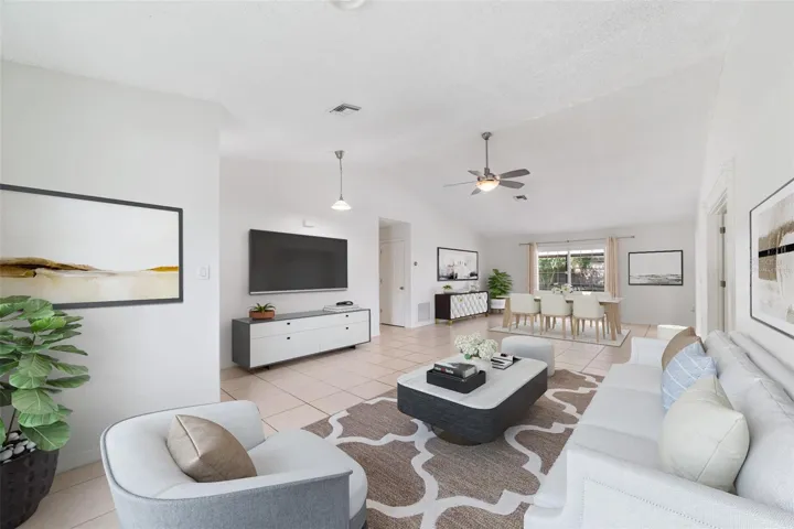 Open living and dining. Virtually Staged.