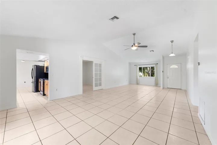 Light, bright open concept with a seamless flow out to the lanai and into the kitchen and flex/office.