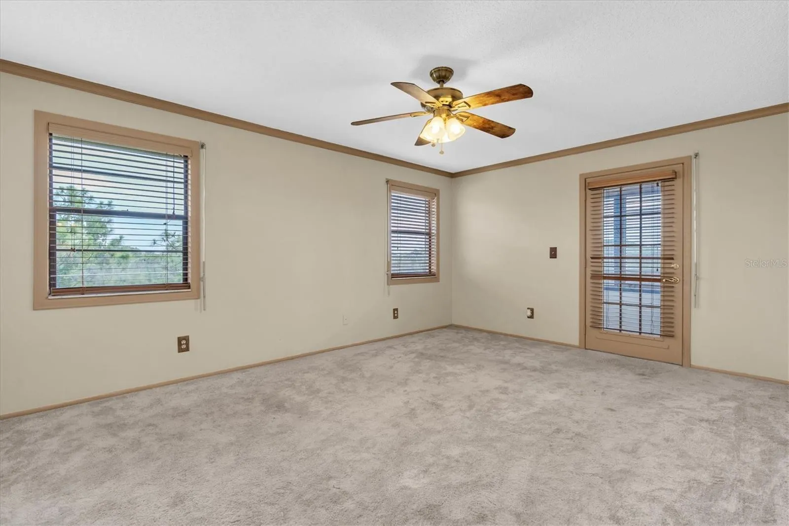 Primary bedroom with an additional enclosed patio