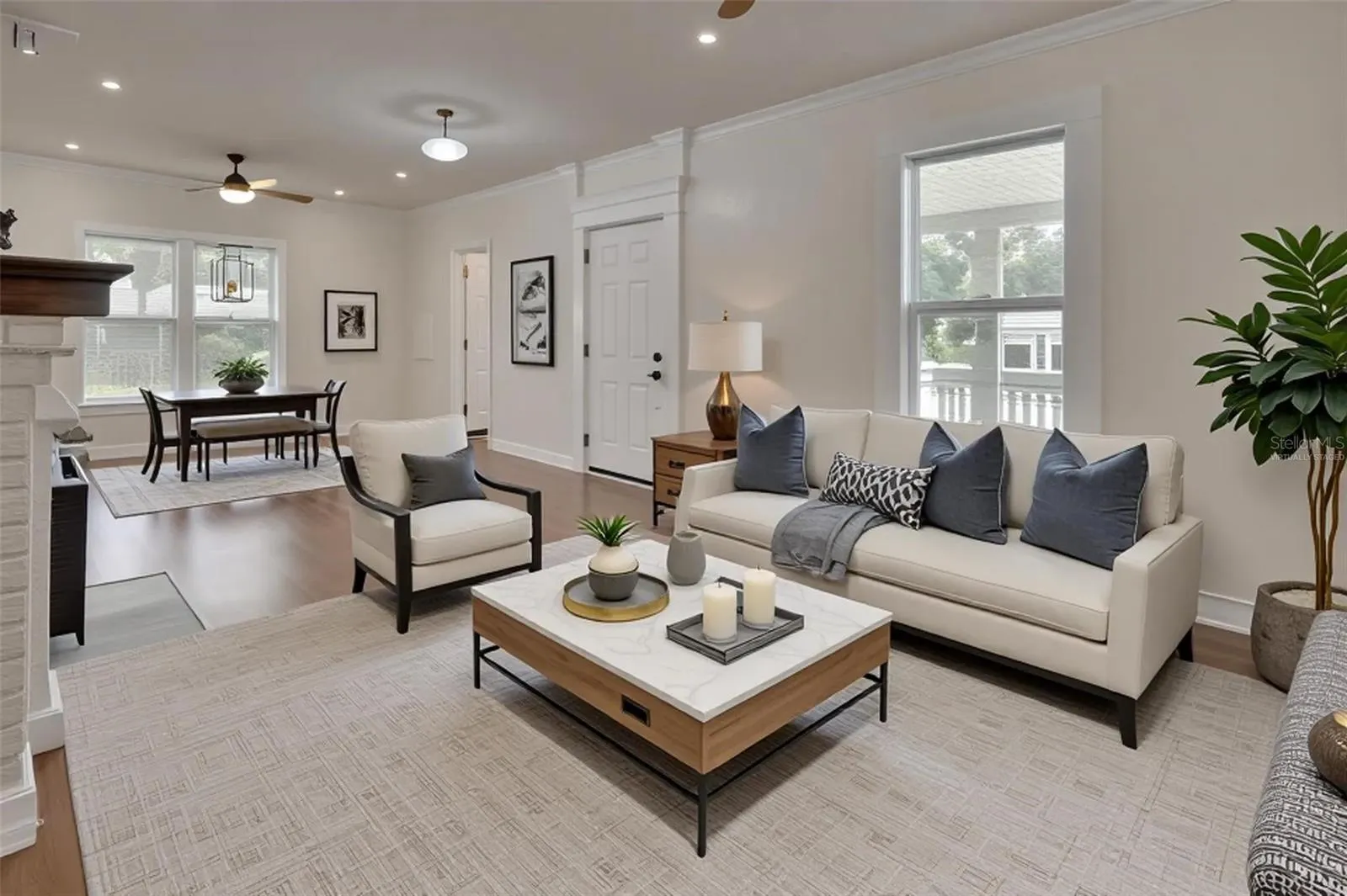 VIRTUALLY STAGED DOWN LIVING RM