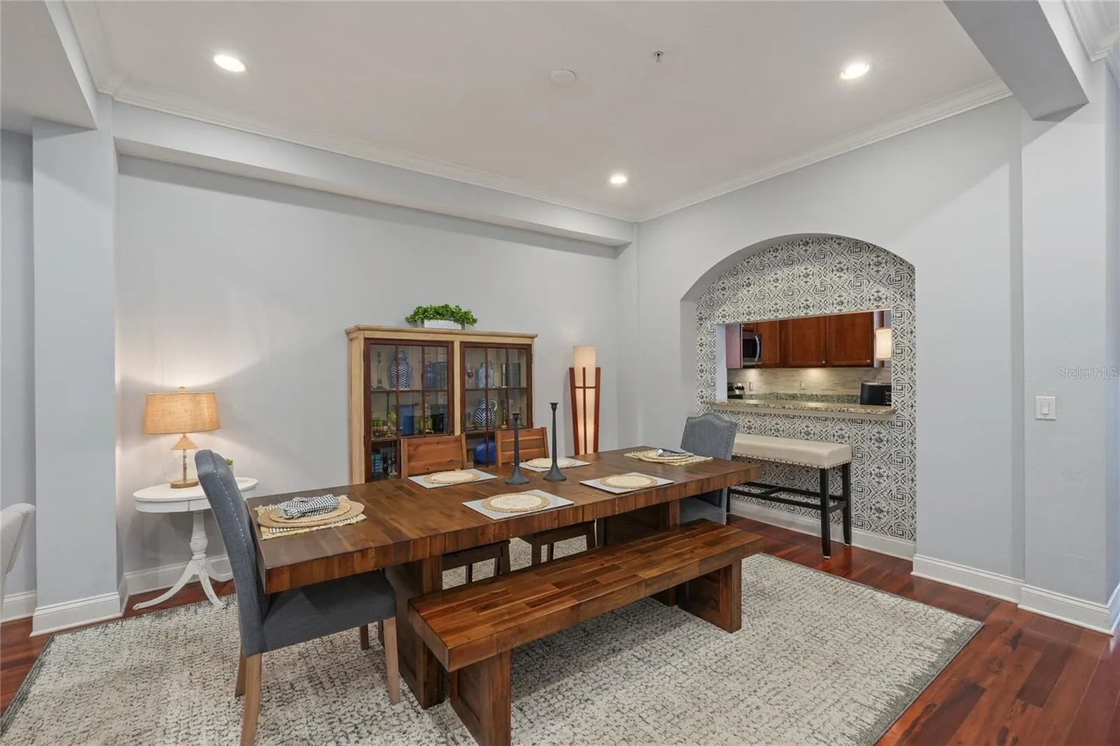 Dining Room with Pass Thru to Kitchen and Tray Ceilings