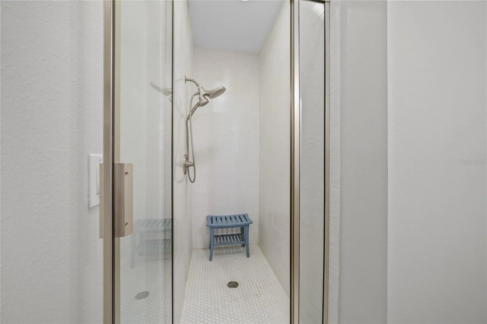 Private Guest Ensuite with beautifully updated shower and new flooring throughout