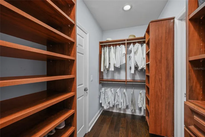 One of Two Primary Walk-In Closets