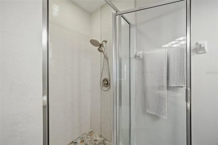 Spa-like Primary Bath - Updated Shower and Tile Flooring