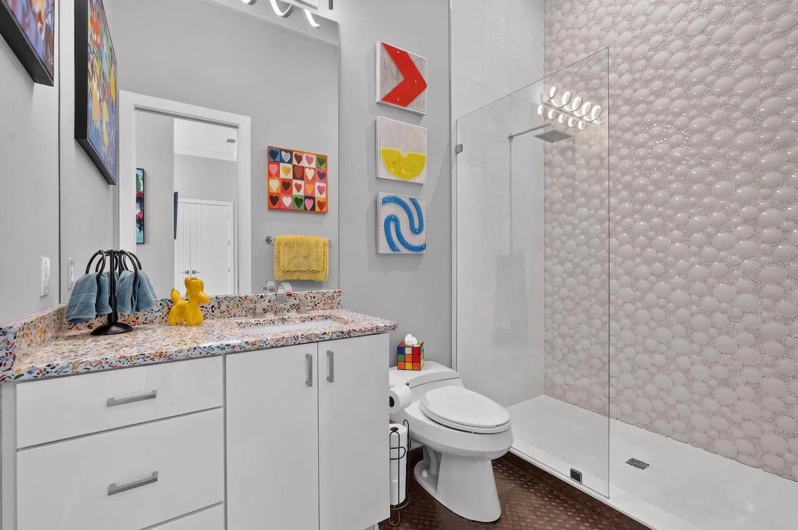 Can we just talk about this shower tile? Such a fun detail and another example of how this home refuses to be ordinary.