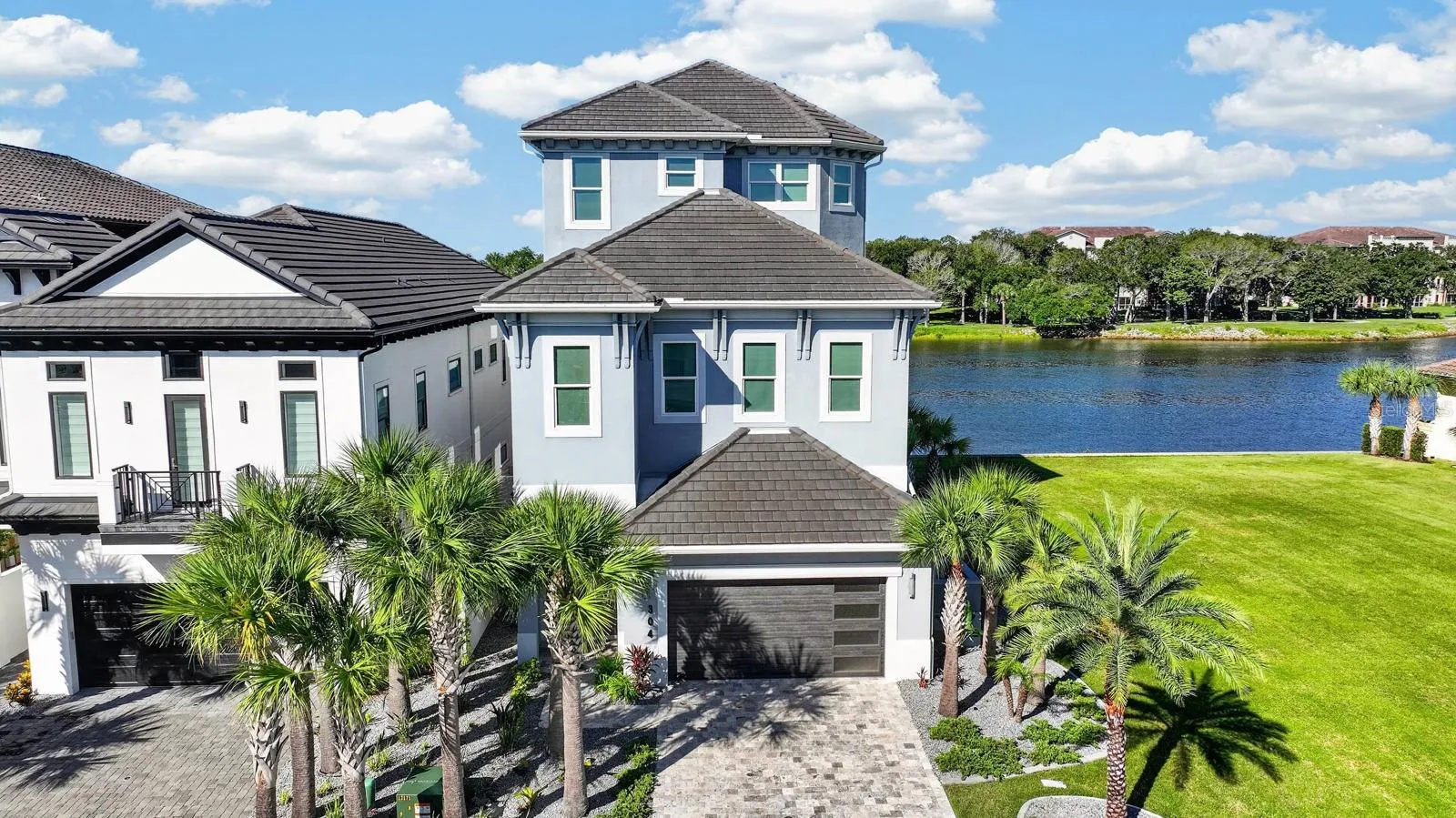 Three levels designed around the water. This 4,150 SF residence lives large, with expansive Intracoastal views and outdoor living from every level.