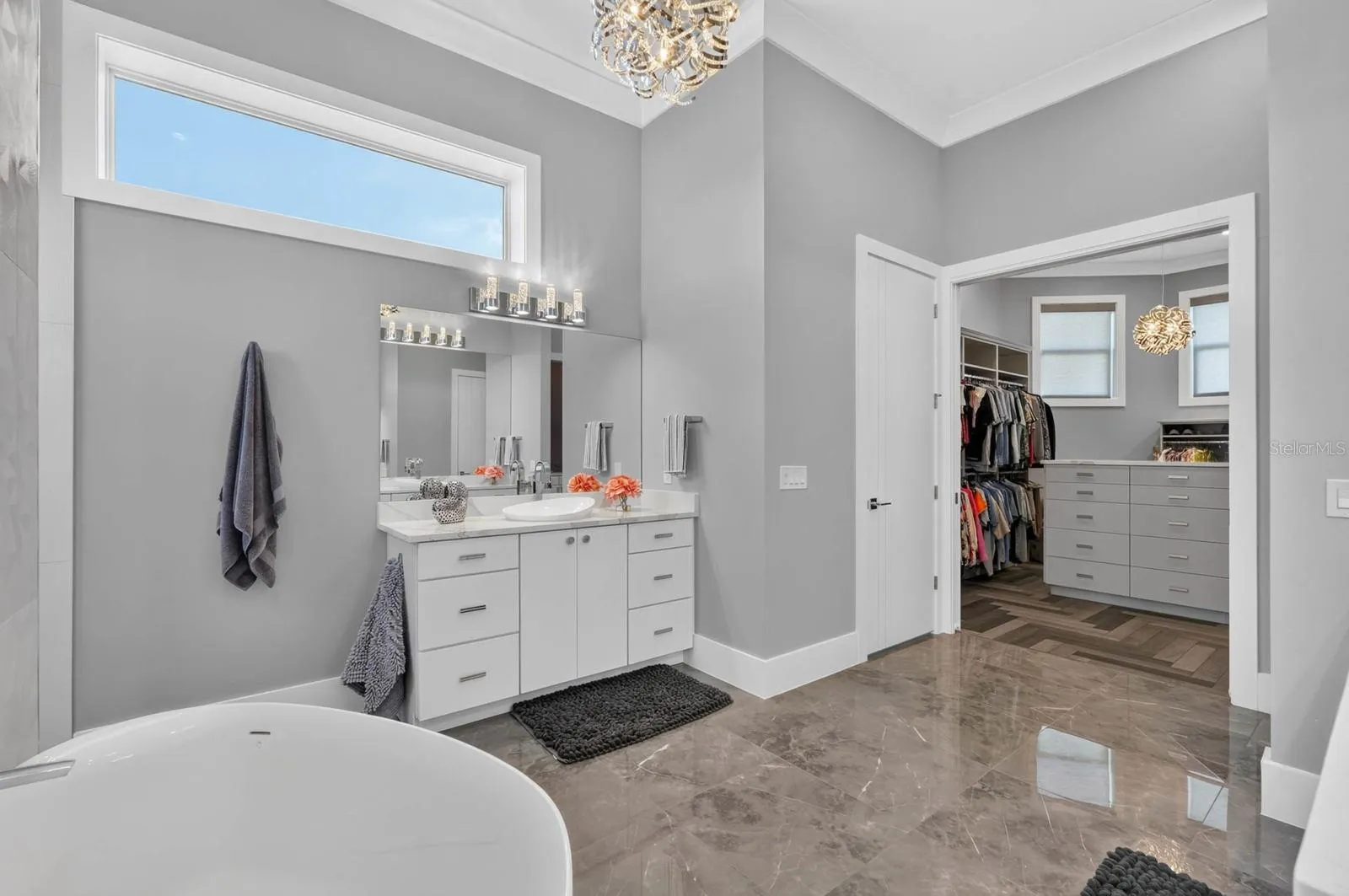 Separate vanities and a beautifully appointed walk-in dressing room… all part of the private owner’s level.