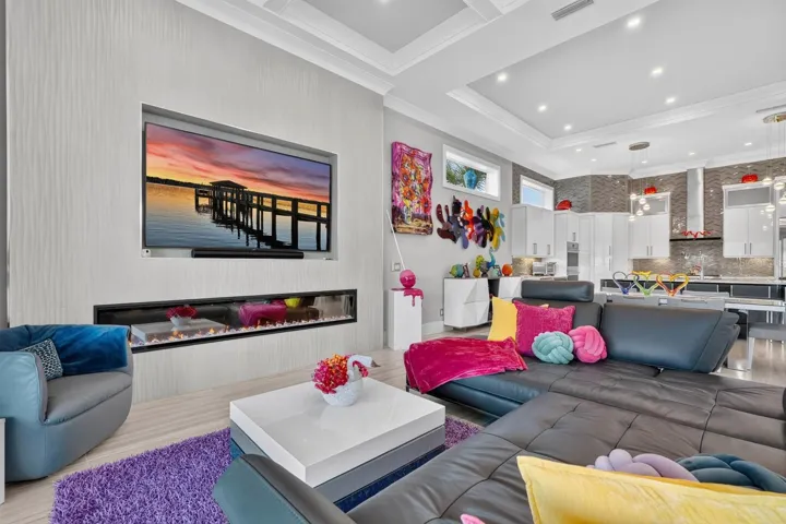 Grand enough to accommodate everyone, yet cozy enough for everyday living. The kitchen, dining, living and outdoor spaces flow together in a way that makes this entire first floor simply feel like home.