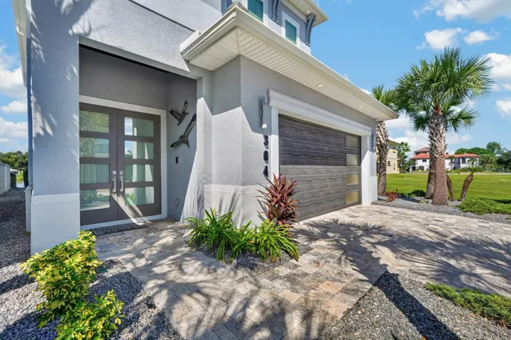 Easy waterfront living. HOA-maintained lawn care and seawall add to the lock-and-leave lifestyle.