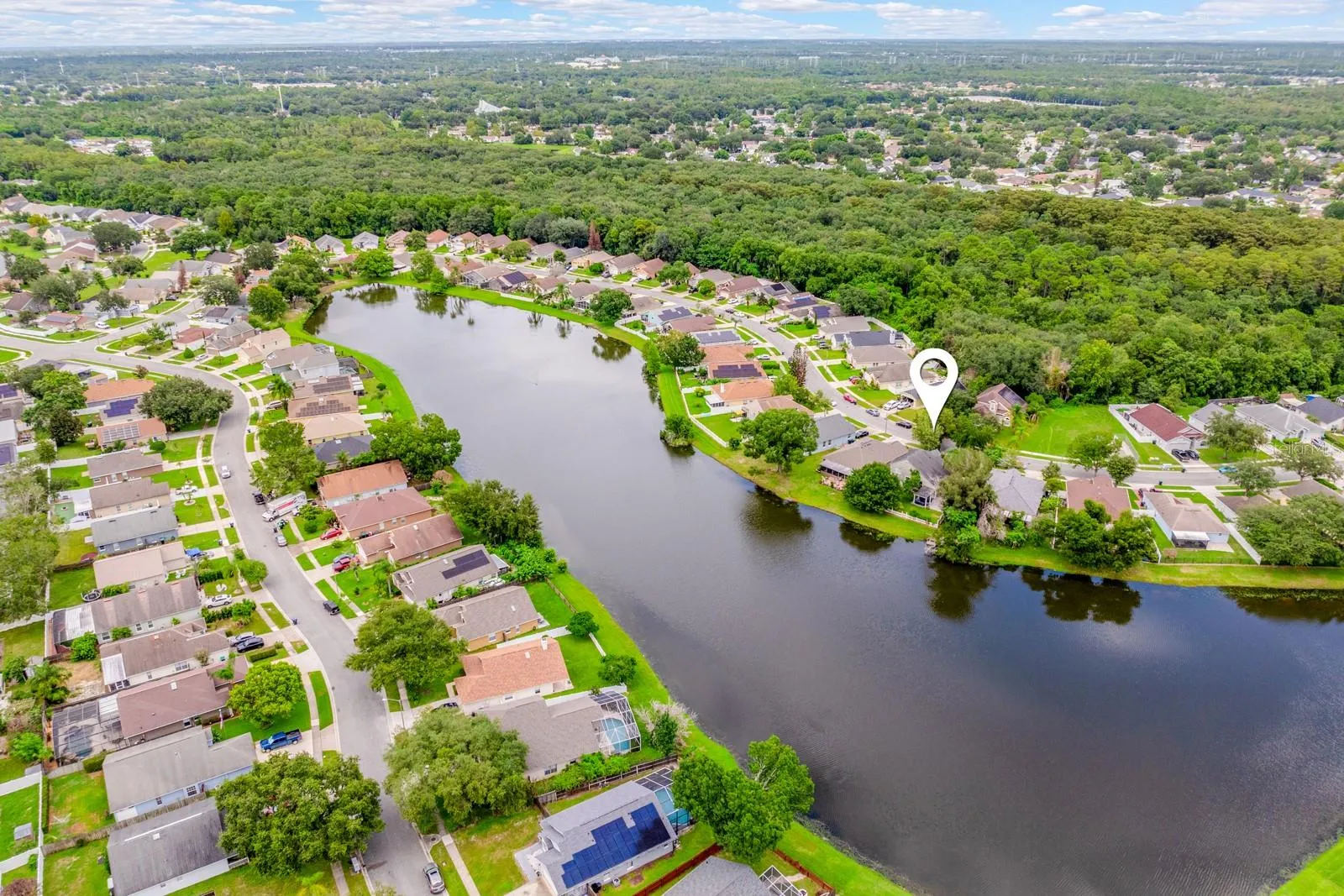 Aerial view of the home and community.