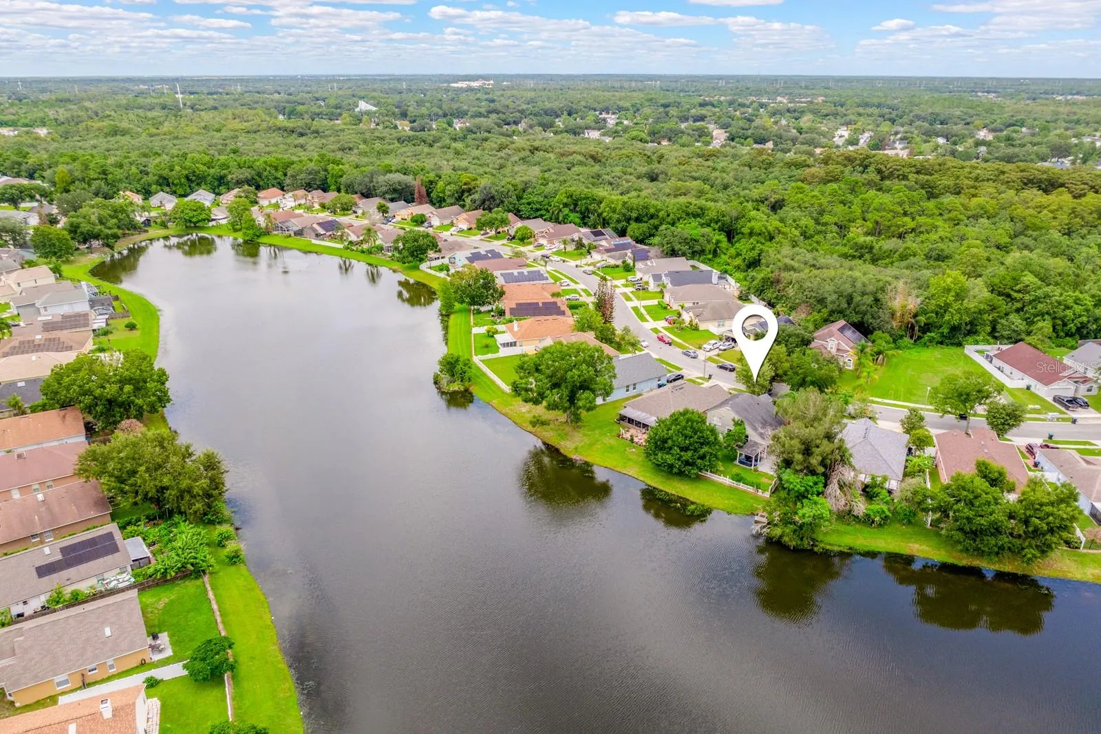 Aerial view of the home and community.