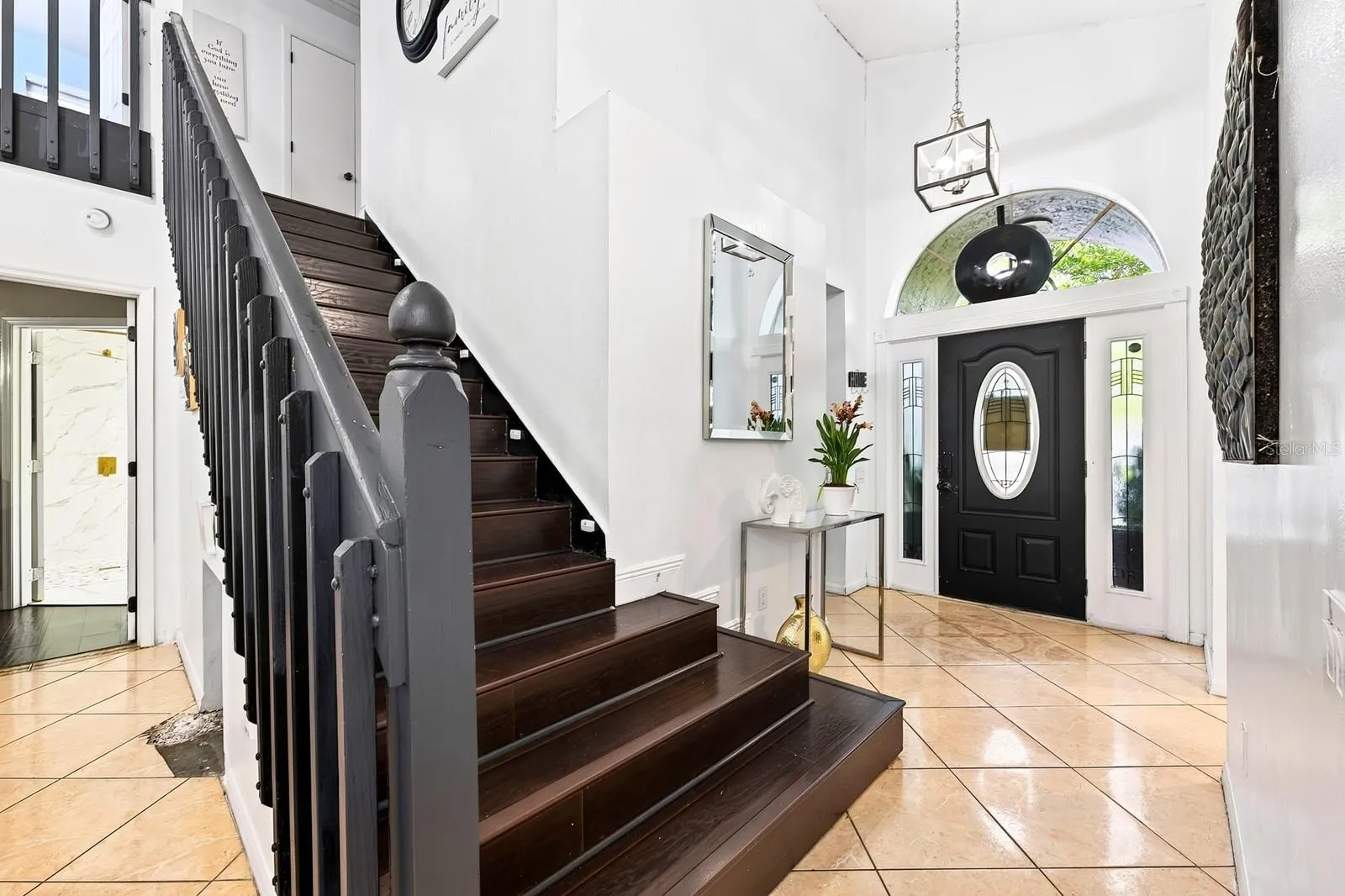 Up the beautiful staircase, you'll find three additional Bedrooms and another full Bathroom.