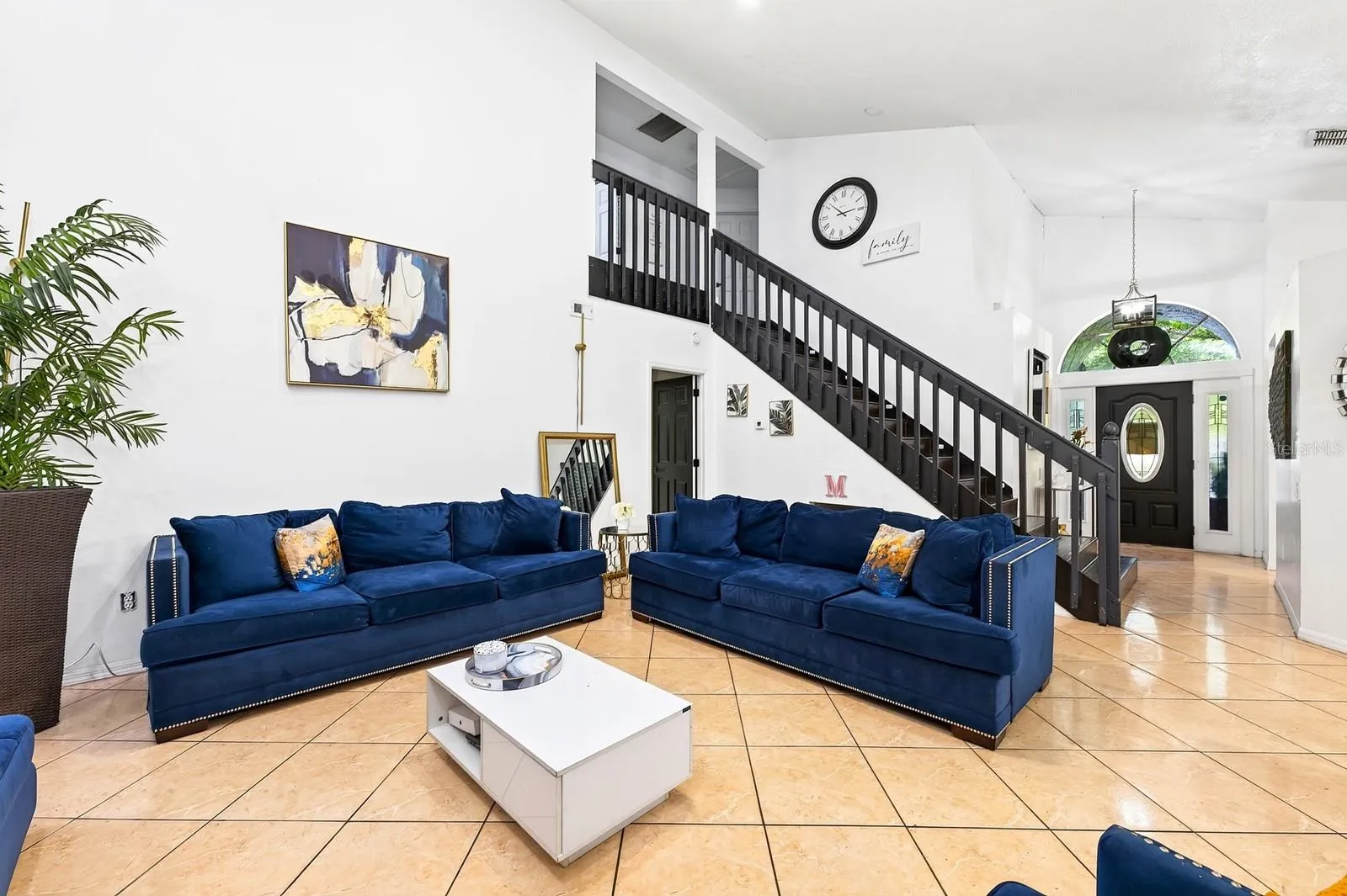 The OPEN-CONCEPT main living areas bring the Living Room and Dining Room together, with abundant windows allowing NATURAL LIGHT to fill the space.