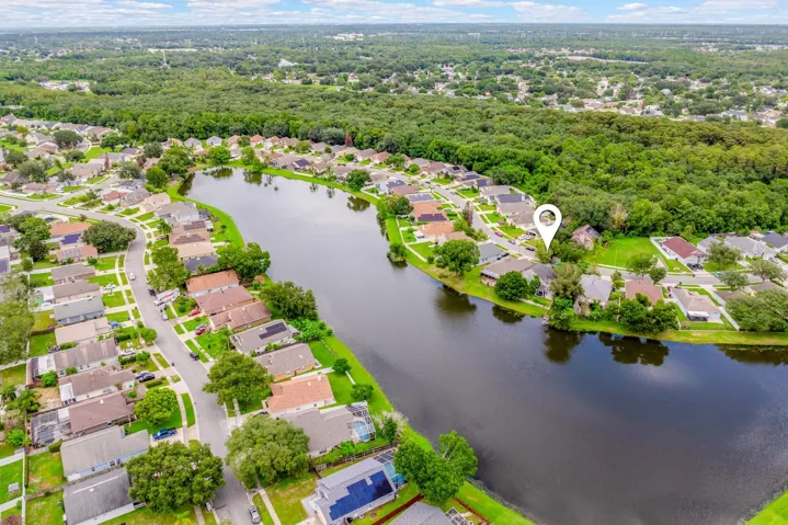Aerial view of the home and community.
