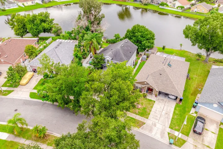 Set in the QUIET Stonebridge neighborhood, this 4BD/2BA two-story home provides a peaceful setting with a BEAUTIFUL LAKE VIEW, space between neighbors and the convenience of a central Orlando location.