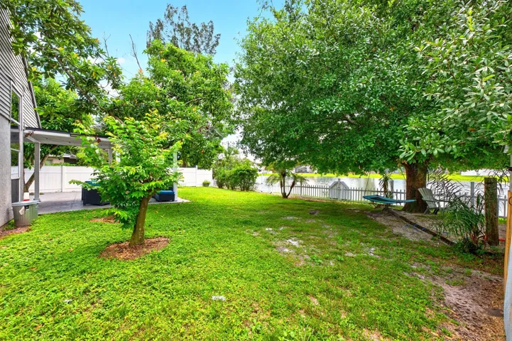 The generous outdoor space is perfect for gatherings or weekend barbecues.