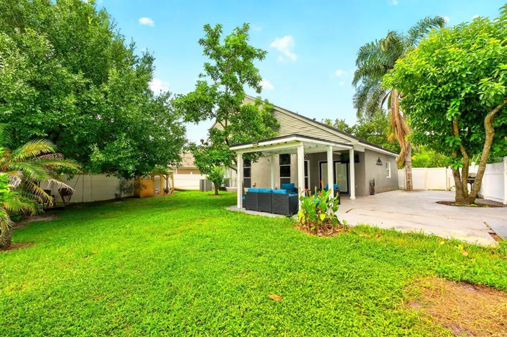 The generous outdoor space is perfect for gatherings or weekend barbecues.