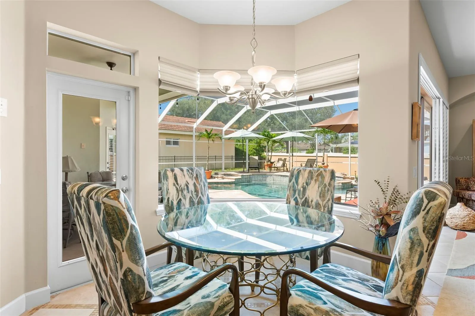 Enjoy daily dining, poolside with the comfort of being indoors
