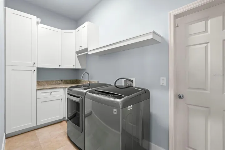 Updated Laundry/Mud Room with entrance to the 3 Car Garage