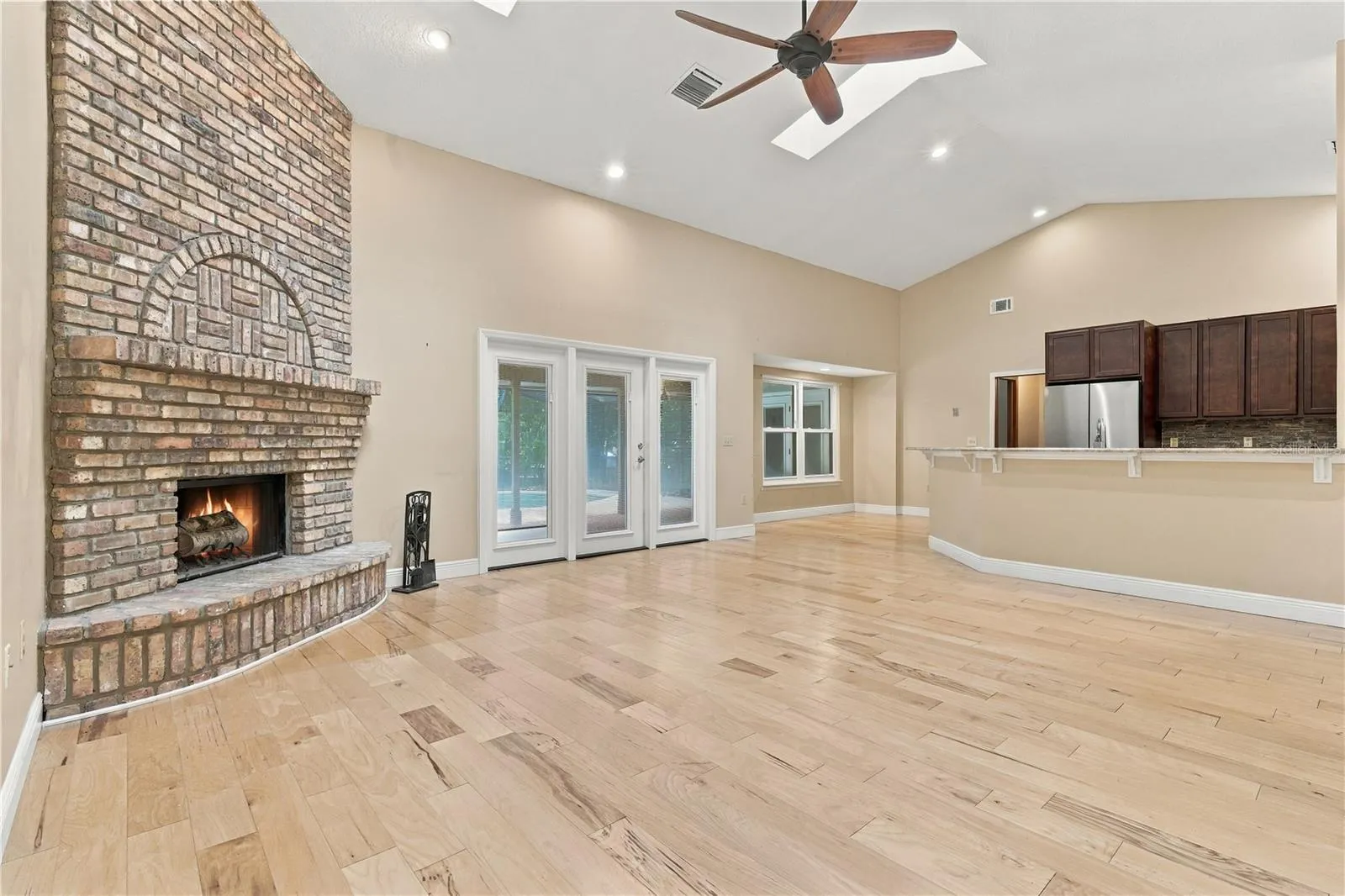 Spacious family room with fireplace.