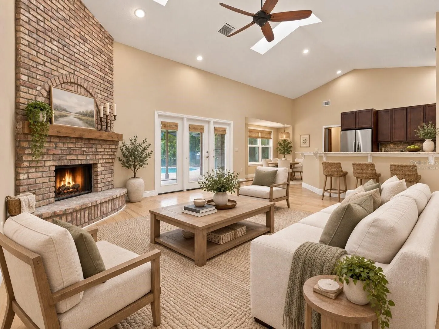 Virtually staged family room with fireplace.