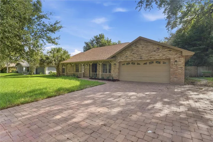 Additional exterior view featuring the attached garage.