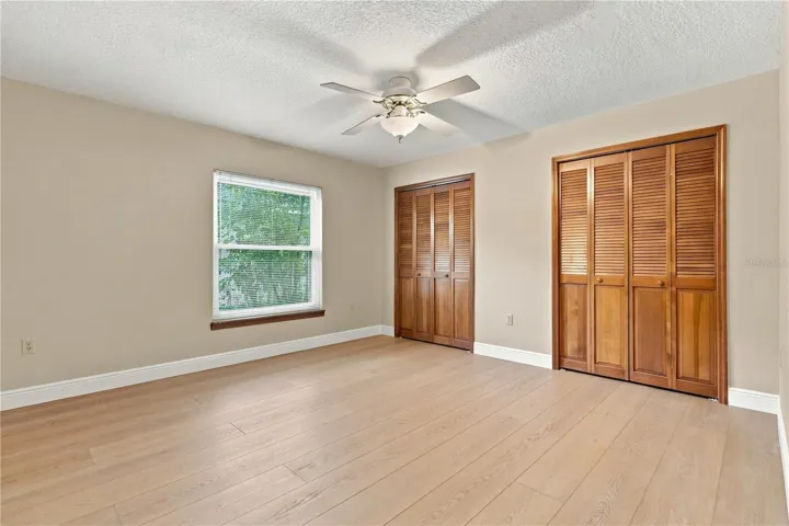 Bedroom with generous closet space.