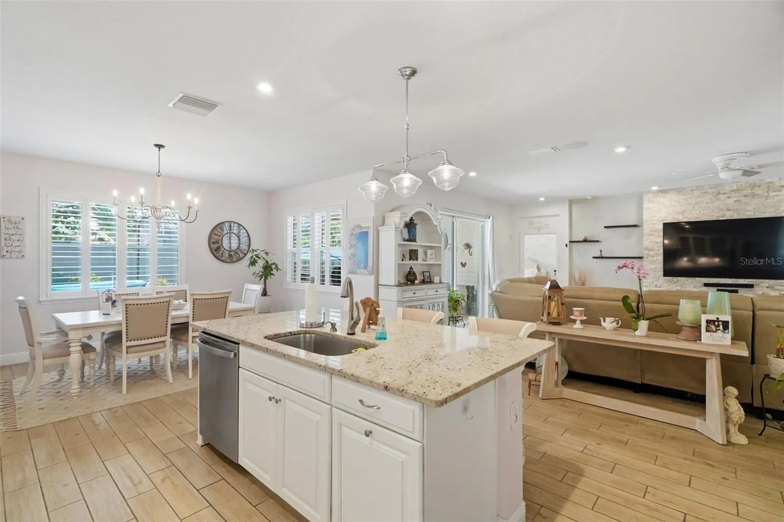 Kitchen overlooks the main living space, creating a functional open-concept layout.